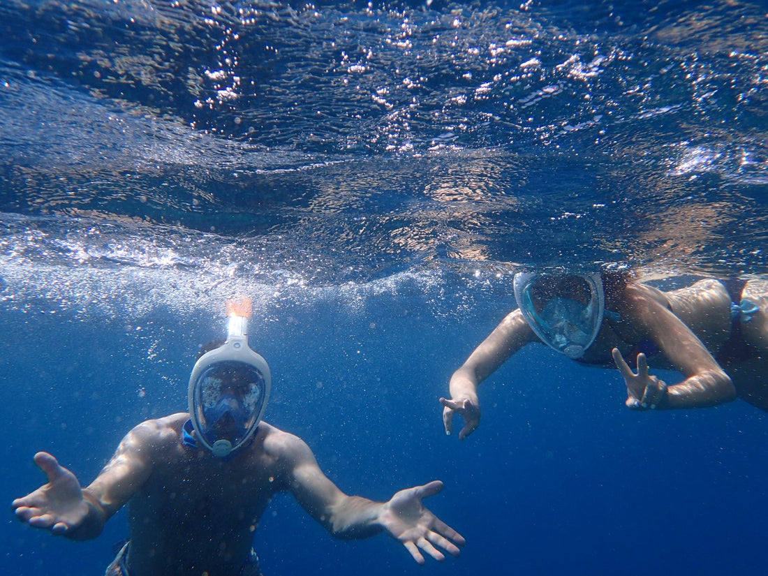 Beginner scuba diver underwater in Bali completing PADI Open Water certification training